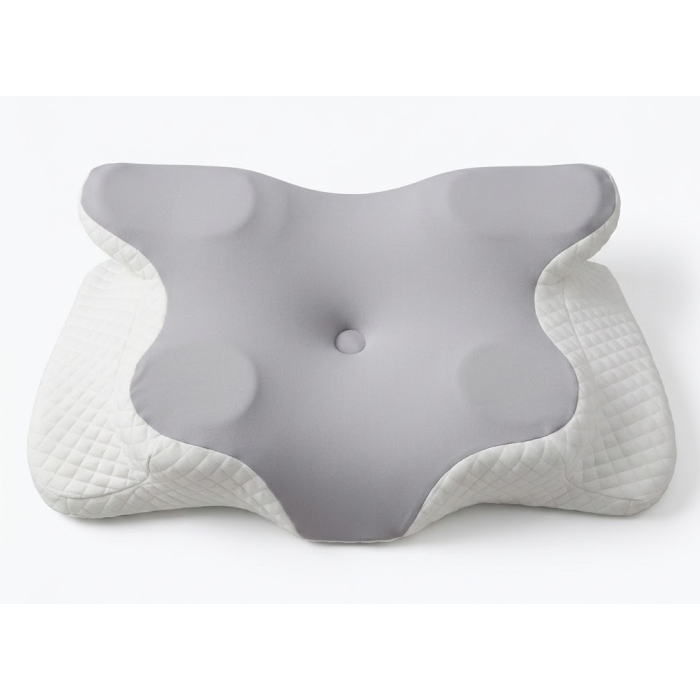 Slaapkussen detail van de witte quilted hoes en grijze memory foam-kern